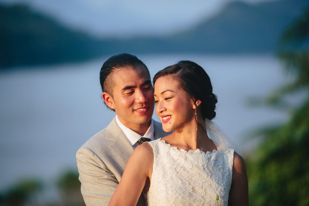 bride and groom smiling together in luang prabang laos