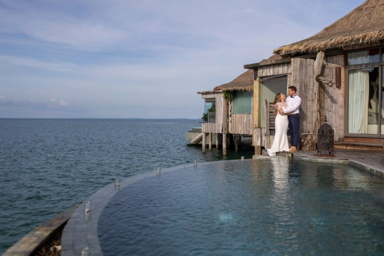 bride and groom at their villa pool on Song Saa Private Island in Cambodia