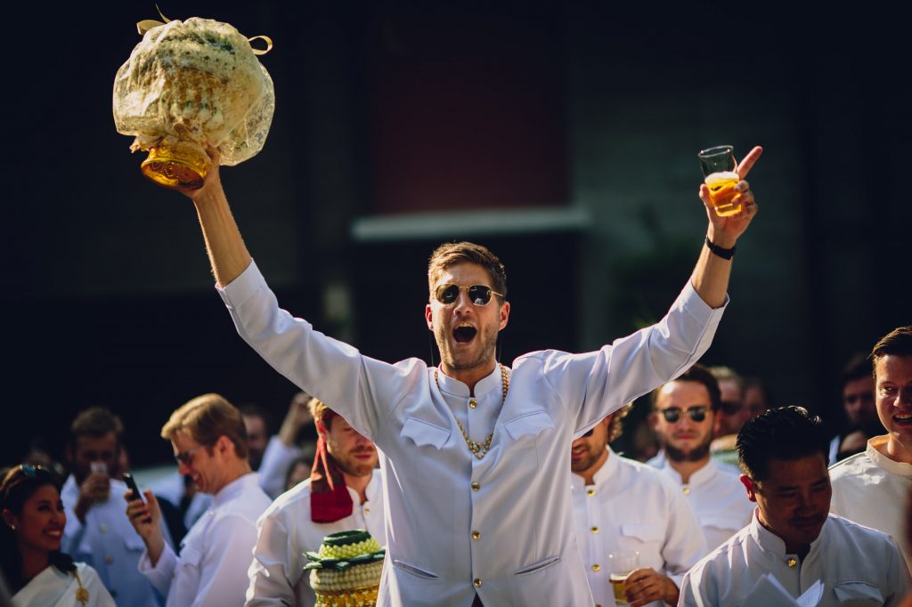 groomsmen parade at jim thompson house wedding in bangkok thailand