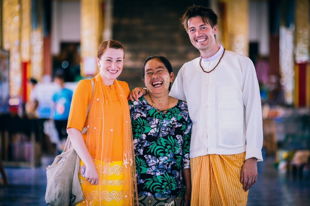 bride and groom pose during their Buddhist wedding ceremony on Inle Lake Nyaungshwe Myanmar