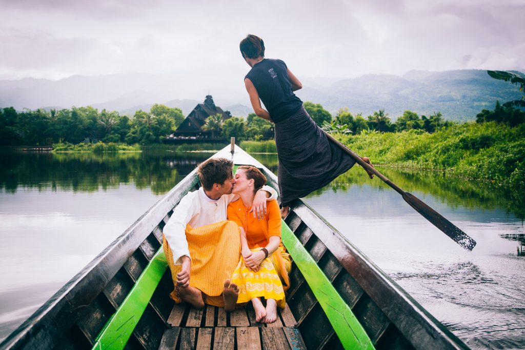 bride and groom kissing on Inle Lake Nyaungshwe Myanmar for their wedding