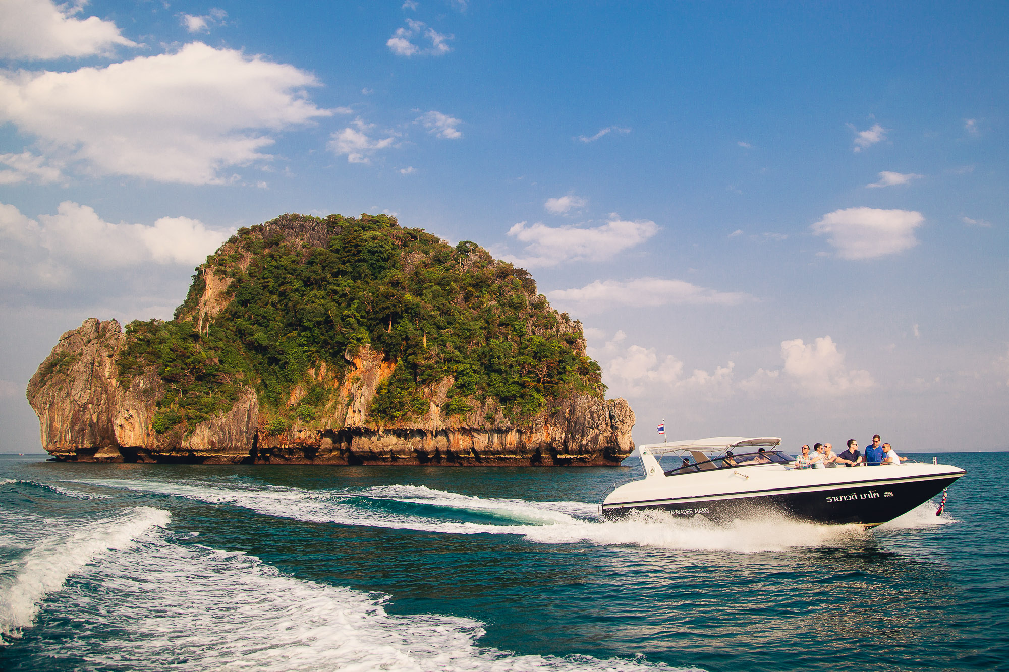 speedboat with wedding guests near Rayavadee Railay beach Krabi Thailand