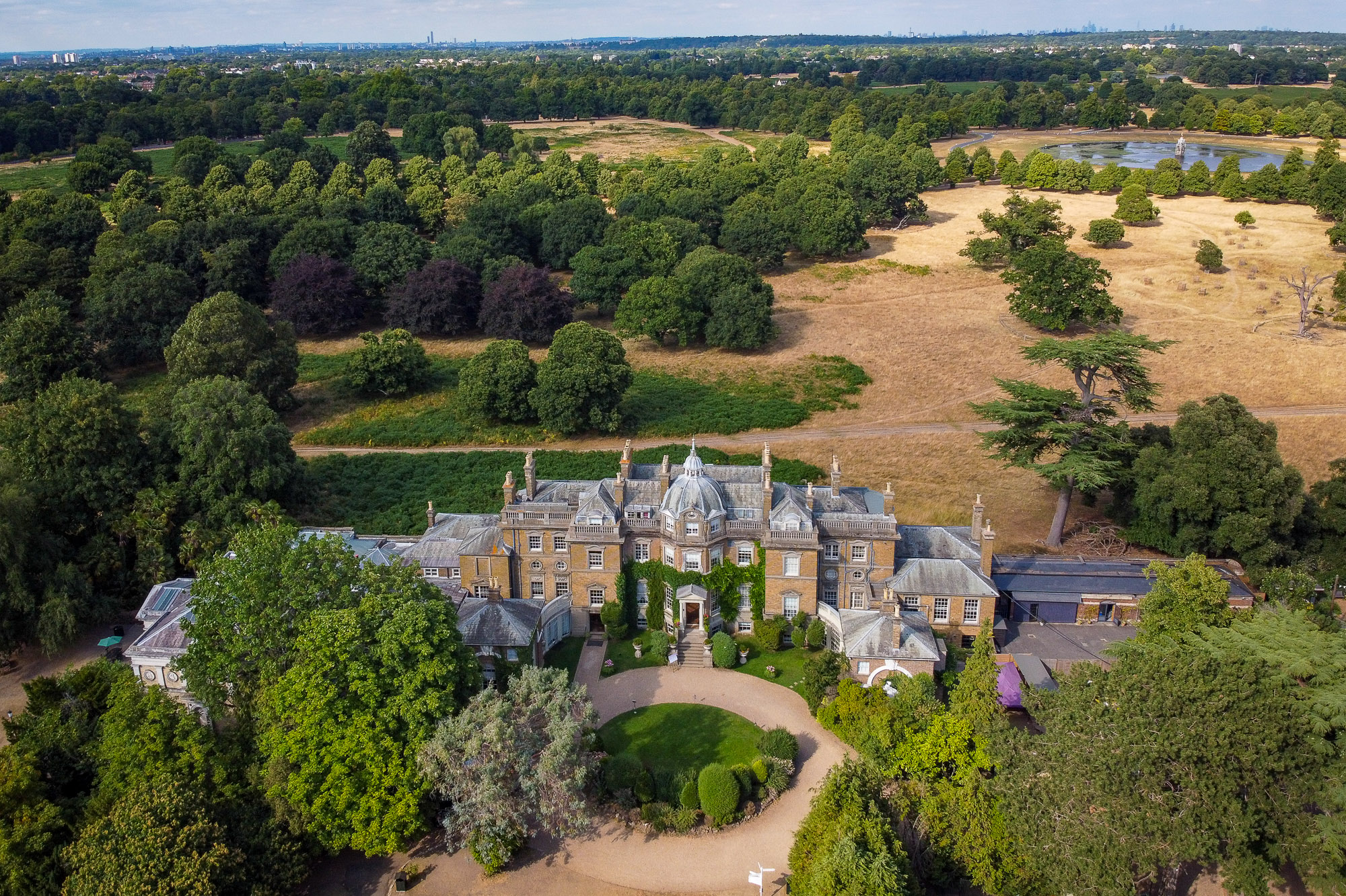 Exquisite Hampton Court House Wedding Photographer