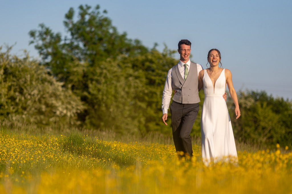 Bride and Groom walking at Old Gore by Yard Space Cotswold Wedding