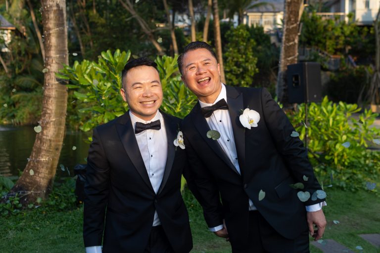 Two grooms celebrating their wedding at The Surin, Phuket